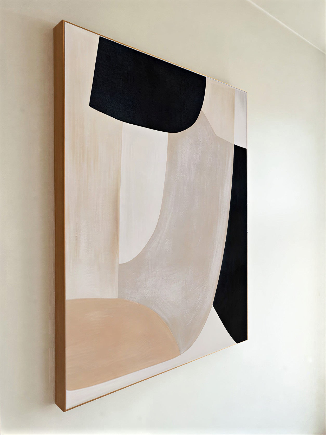 Abstract art piece with geometric shapes on a white wall