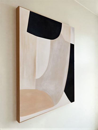 Abstract art piece with geometric shapes on a white wall