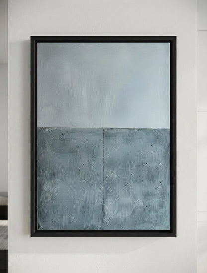 Blue gray textured canvas painting online for luxury modern wall decor by Noho Art Gallery featuring a textured, two-tone blue and gray design, hung on a clean white wall.