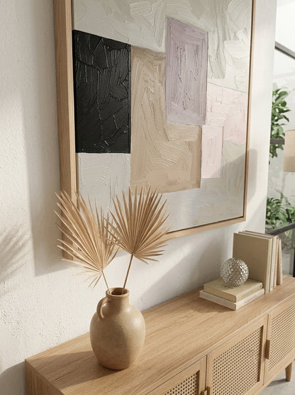 Framed Textured Geometric Abstract Original Painting by Noho Art Gallery, with a Decorative setup with a vase, books, and a mirror on a wooden console table.