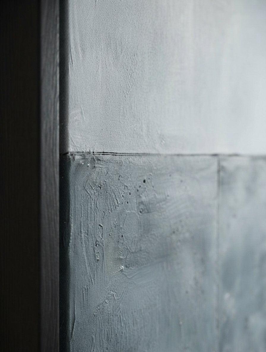 Close-up of a Thick texture blue gray canvas artwork for modern interior design by Noho Art Gallery or panel with a horizontal seam, showing painted plaster-like surfaces in soft gray and white tones.