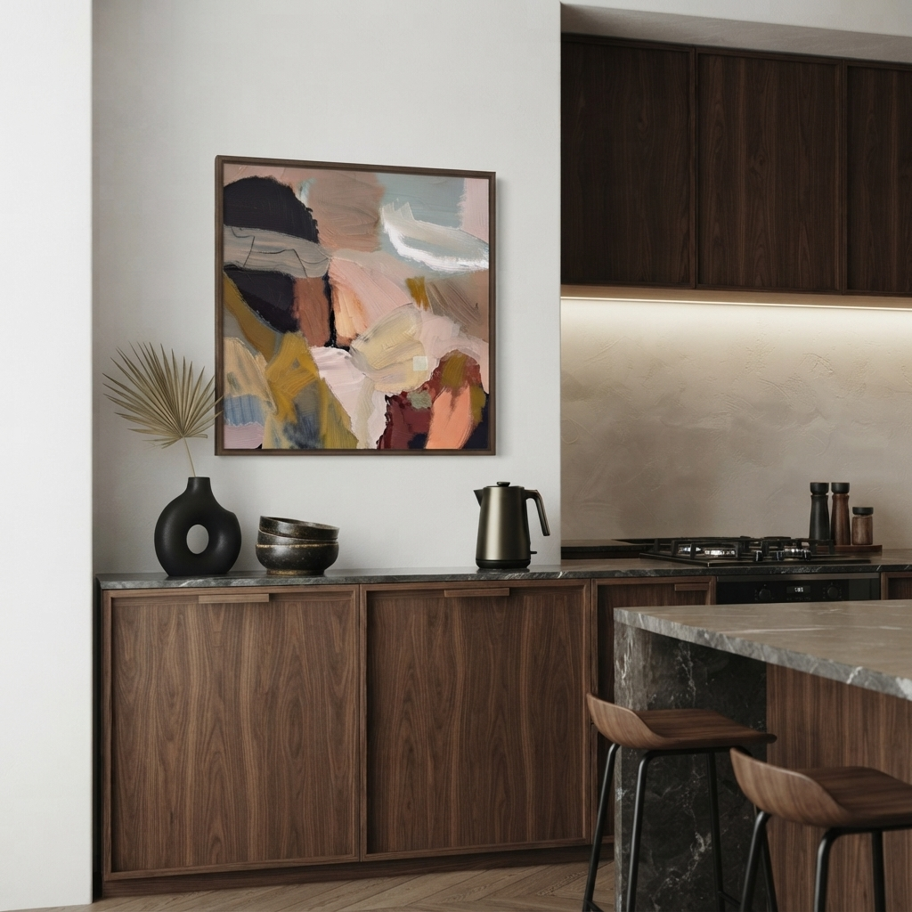 An Framed  Contemporary minimalist oil painting, original abstract oil painting, abstract art with earth tones, hand-painted textured abstract canvas with warm earthy tones by Noho Art Gallery hangs on a white wall above a modern kitchen counter with dark wood cabinets, a kettle, and decorative vases.