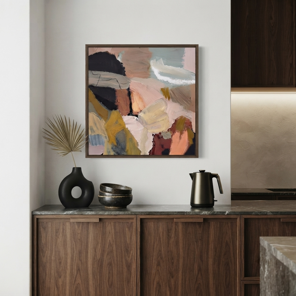 A framed Fine art abstract canvas, large textured abstract canvas art, earthy neutral abstract wall art, contemporary minimalist oil painting by Noho Art Gallery with earthy tones of pink, beige, brown, black, and muted blue, displayed on a white wall above a dark wood sideboard with a black vase and a metal kettle.