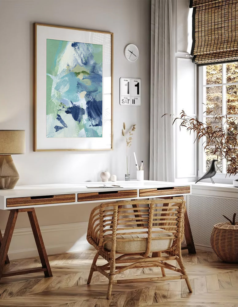 Home office with a desk, chair, and decorative elements.