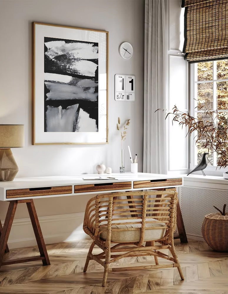 Home office with a desk, chair, and decorative elements.