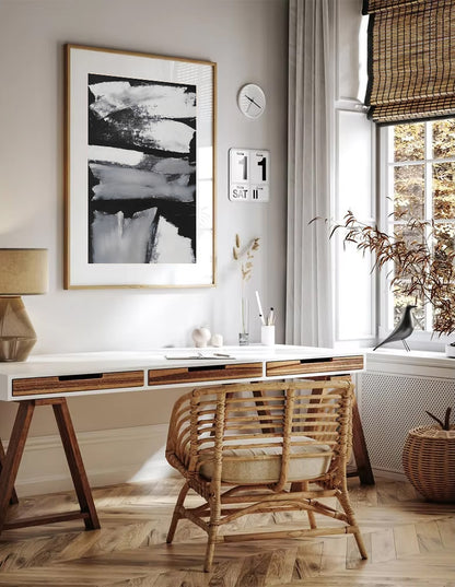 Home office with a desk, chair, and decorative elements.