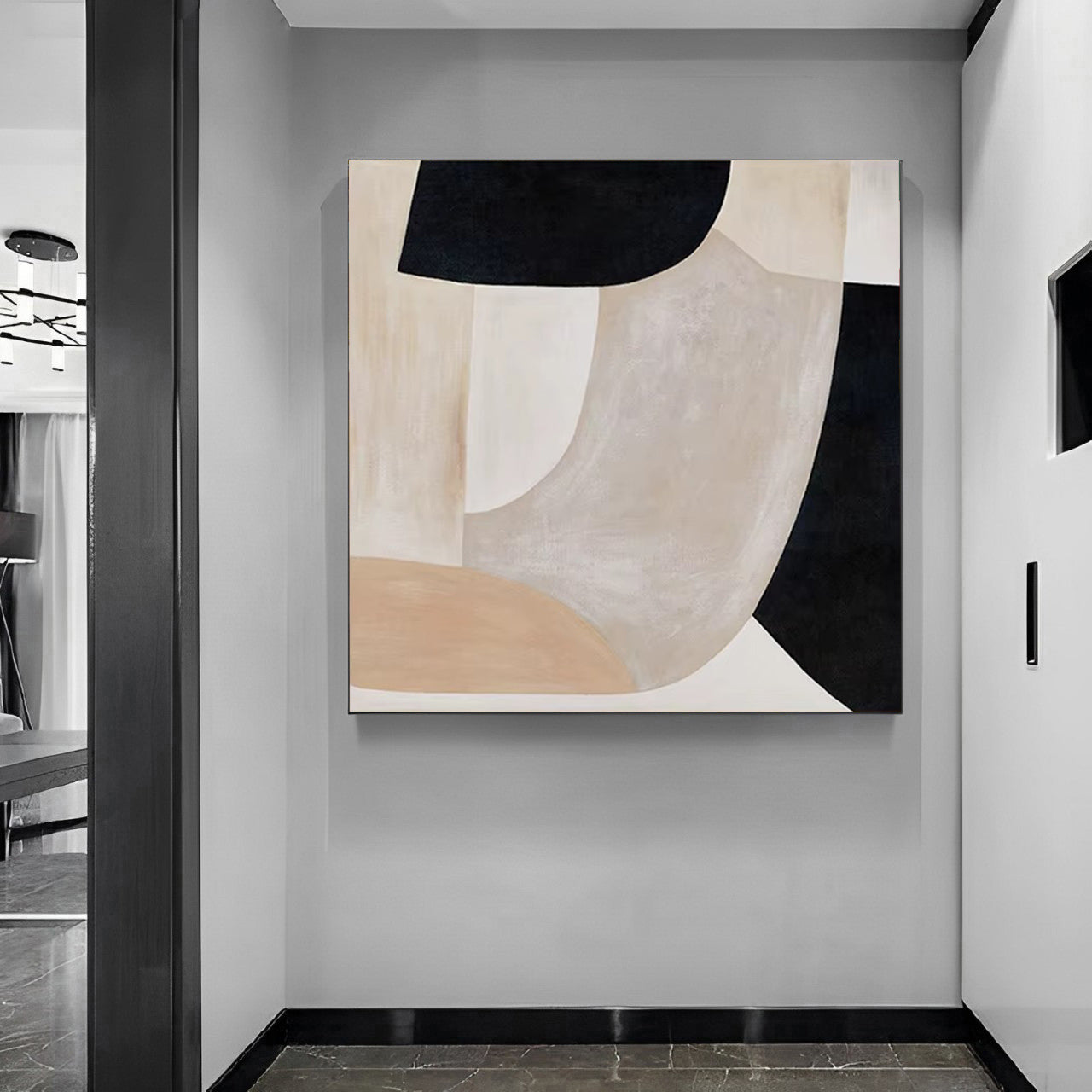 Abstract art piece on a wall in a modern interior setting