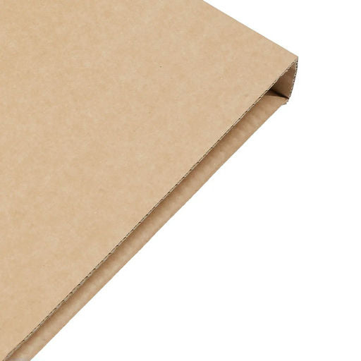 Close-up of brown cardboard with a white background