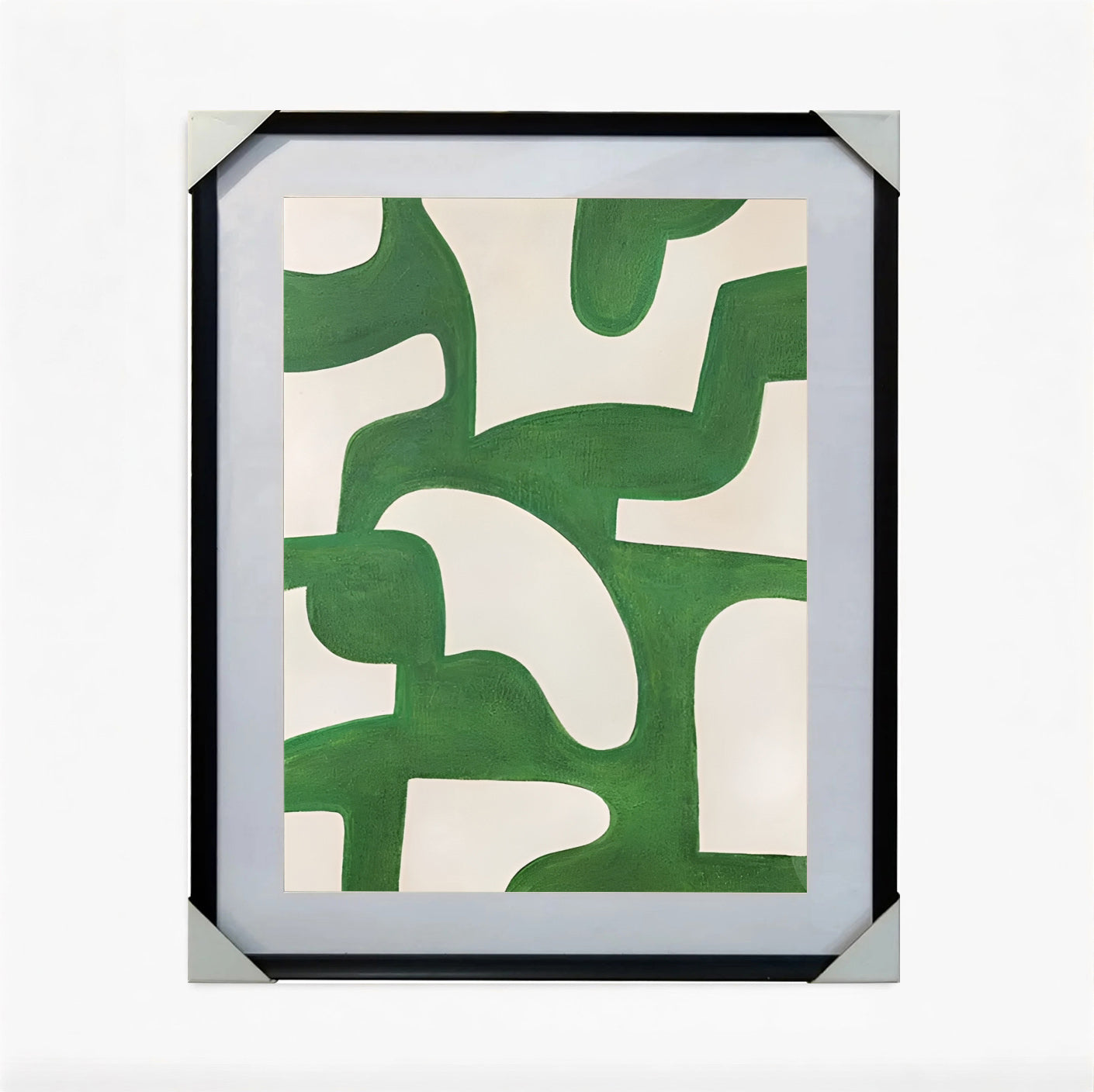 Framed abstract art with green and white shapes on a white background