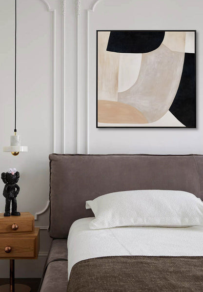 Modern bedroom with abstract art on the wall, bed, and nightstand.