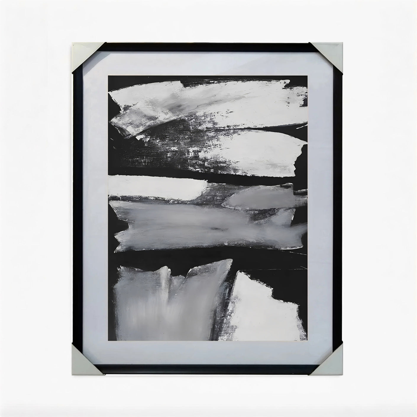 Framed black and white abstract art on a white background