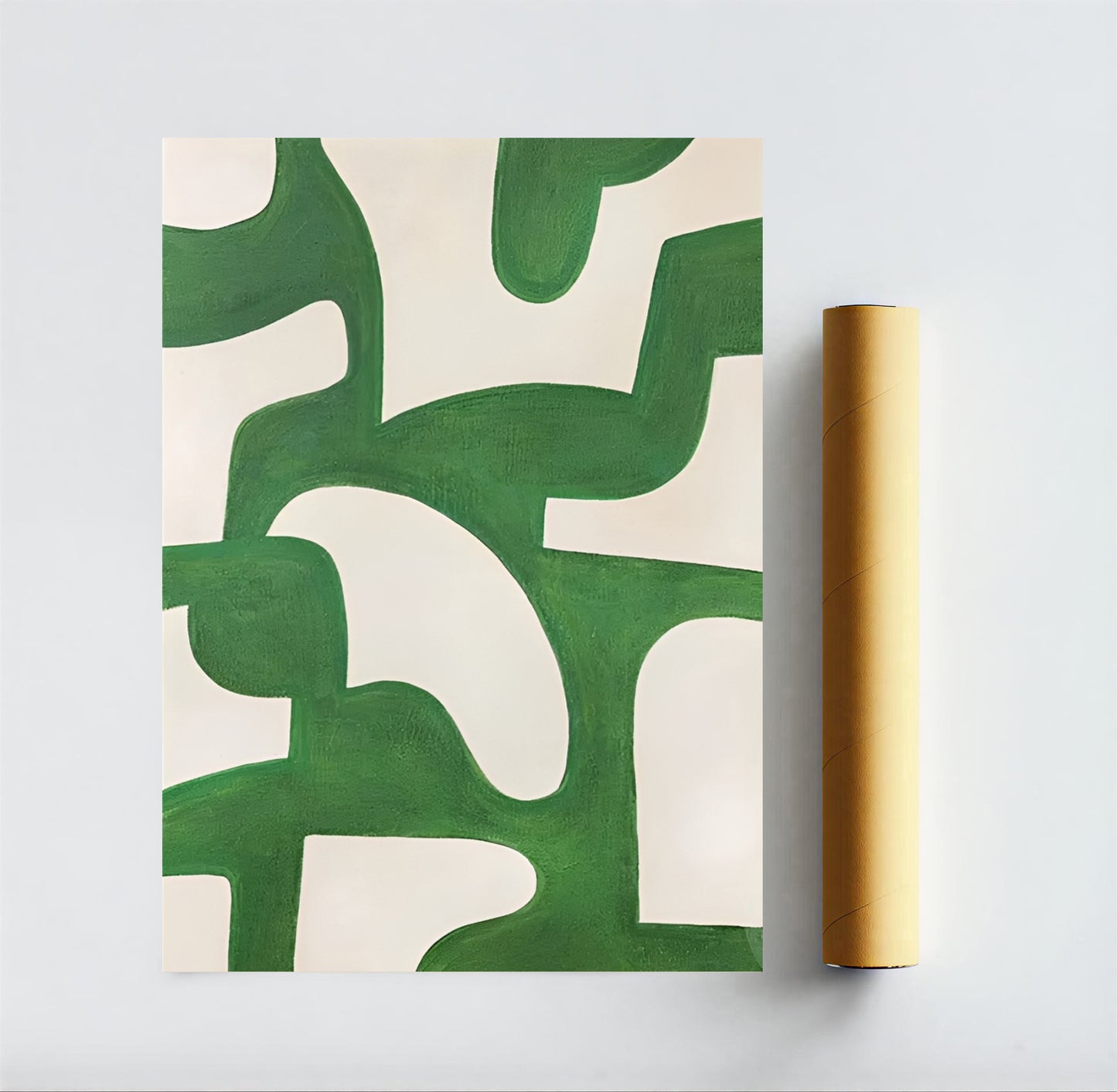 Roll of green abstract patterned paper on a white background